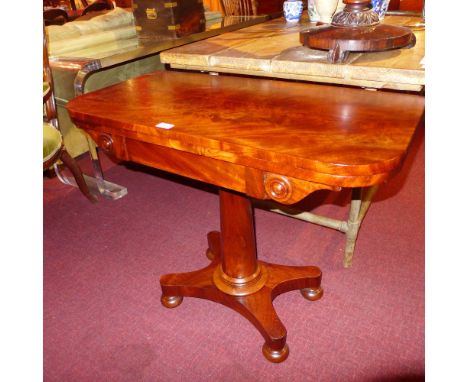 A Regency mahogany card table the foldover top raised on column supports and quadruped base