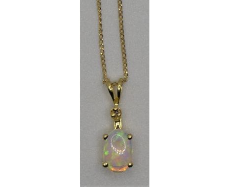 A 10k gold and opal pendant, 9ct gold chain, 