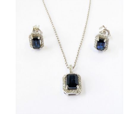 A 14-carat white-gold sapphire and diamond cluster pendant and chain together with matching earrings (earrings approx. 7mm, p