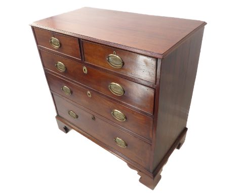 A late 18th century mahogany chest; the thumbnail moulded top above two half-width and three full-width graduated drawers, ra