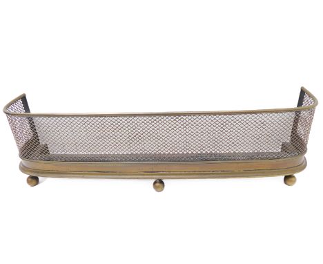 A brass fireguard on three ball feet (94cm wide x 25cm high)
