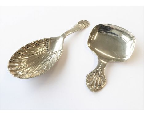 Two silver caddy spoons: one of shell form with assay marks for Sheffied 1906, the other Sheffield 1921