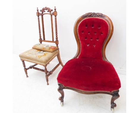 A mid-19th century&nbsp;nursing chair,&nbsp;walnut-framed, red-velour button-back upholstered and on cabriole legs with casto