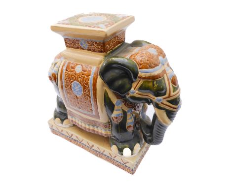 A Chinese ceramic plant pot stand modelled as an elephant (51cm high x 49cm widest)