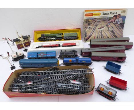 A 1980s Tri-ang Hornby 00 gauge model railway set to include 2 steam engines with coal carts (The Flying Scotsman and Lord We
