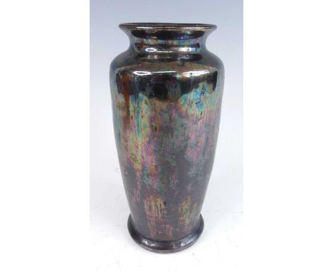 Attributed to Ruskin Pottery - an early 20th century iridescent lustre glazed pottery vase, of slender baluster form, unmarke