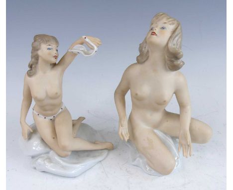 Two female nude porcelain figures by Wallendorf, each partially white glazed and in kneeling pose, printed backstamps verso, 