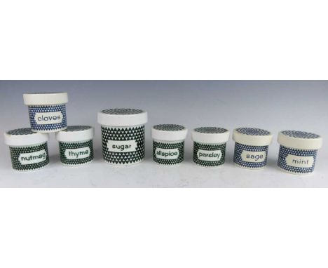 Robert Jefferson (British, 1929-1998) for Poole Pottery - a collection of eight various circular storage jars and covers, tit