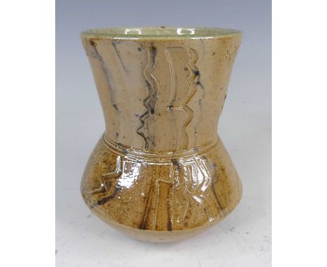 Michael Casson (British, 1925-2003) - an angular studio pottery vase, raised and relief incised stylised decorated in tones o