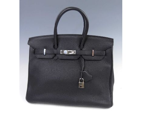 Hermès - a Birkin 35 black leather handbag, pigment textured, chromed metal hardware, twin handles, padlock with two keys, th
