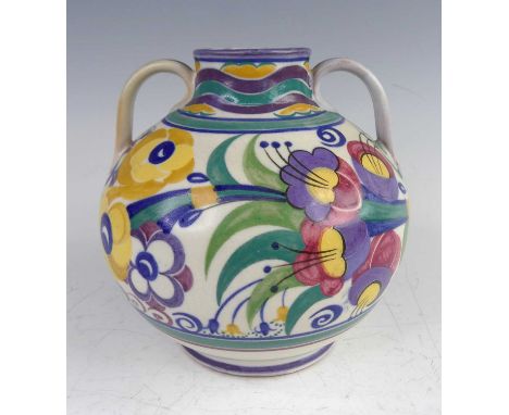 A 1930s Poole pottery 'Fuschia' pattern twin handled bulbous vase; for Carter Stabler Adams Ltd, typically bright colour flor