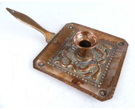 John Pearson (act.1885-1910) for Newlyn School - a hammered and embossed copper chamberstick, with slightly shaped handle, st