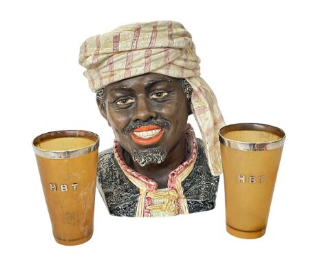 Pottery tobacco jar depicting Moorish man's head and pair of Scottish horn beakers by Ferguson and Marbean, Inverness.