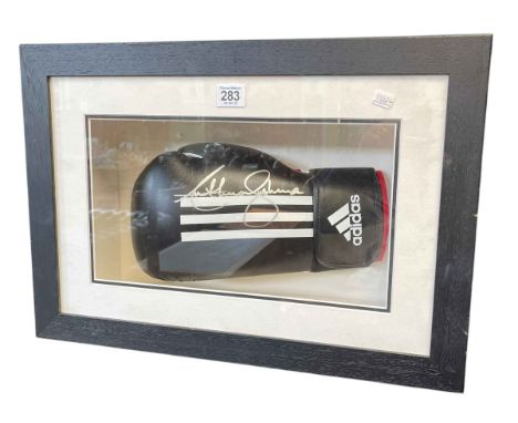 Boxing Glove signed by Antony Joshua. Donated by James Harsine (former strength and conditioning coach to GB Boxing at London