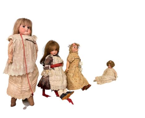 Four vintage bisque head dolls including one stamped STBJ236 Paris and another stamped CHERIE 8.