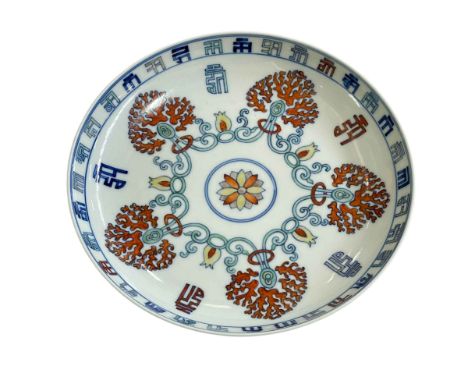 Chinese pottery plate with geometrical decoration.