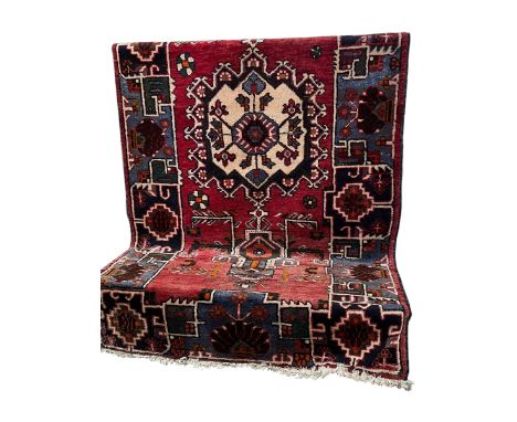 Persian design wool rug with central medallion 2.70 by 1.28.
