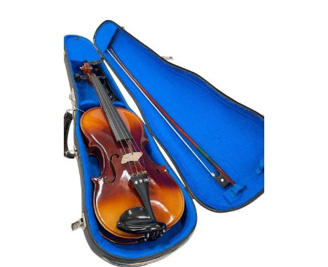 Violin in case with bow.