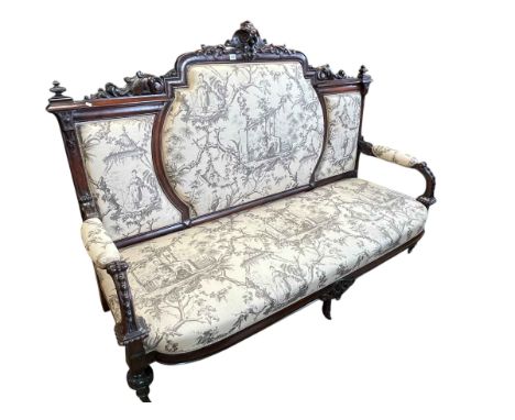 Victorian carved rosewood arched panel back open arm settee, 128cm by 186cm by 67cm.
