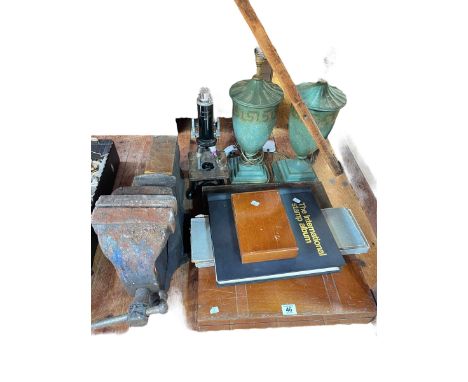 Pair of lamps, stamp album, coinage, microscope, vice, etc.