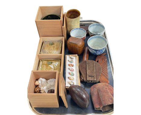Collection of Oriental Ware including Netsukes, tea bowls, horn beaker, two pouches, pipe, comb, etc.