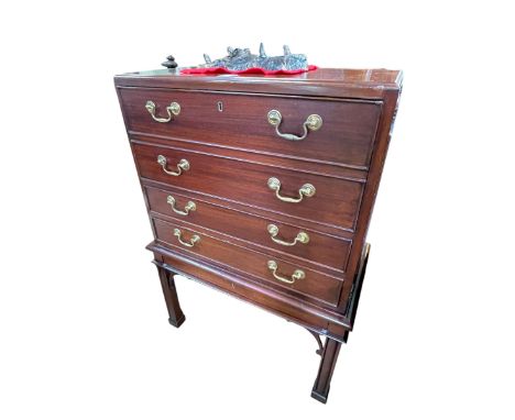 Polished mahogany secretaire chest, the fall front above two long drawers and shallow base drawer, 103cm by 73cm by 38.5cm.