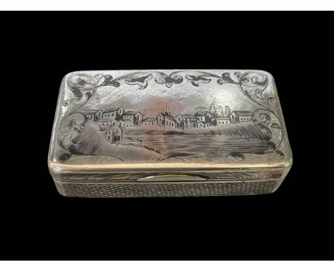 Russian niello silver snuff box, the lid and base with town scenes, dated 1860, 7.5cm across.
