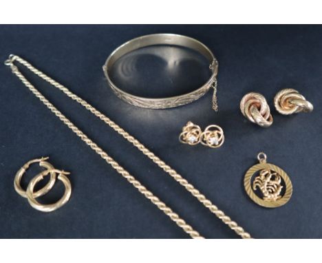 A 9ct gold hinged bangle together with a 9ct gold rope twist necklace, 9ct gold earrings, approximately 39 grams