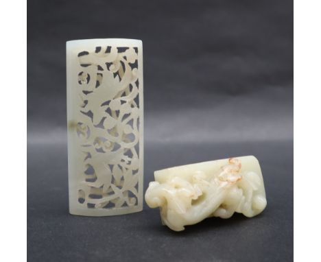 A Chinese "jade" hardstone panel with pierced decoration depicting deer and leaves, 7.5cm long together with another panel wi