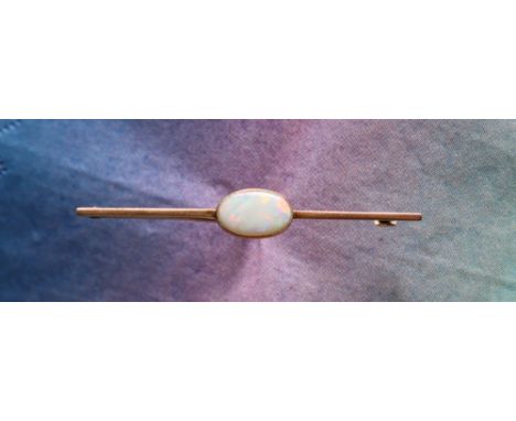 A 9ct gold opal set bar brooch, the opal approximately 12mm x 8mm, approximately 3.5 grams