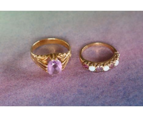 A 9ct gold amethyst set dress ring set with an oval faceted amethyst to a 9ct gold setting and shank, size R together with a 