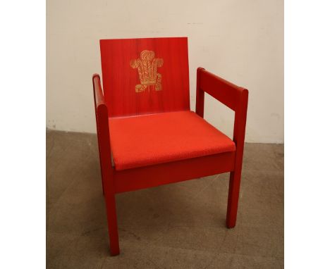 A Prince of Wales Investiture Chair, The Earl of Snowden and Carl Toms, a red painted beech and laminate elbow chair produced