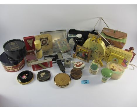 Ladies vanities including one compact bag, enamel cosmetic box, YSL powder box, vintage Rubenstein perfume bottles, compacts 