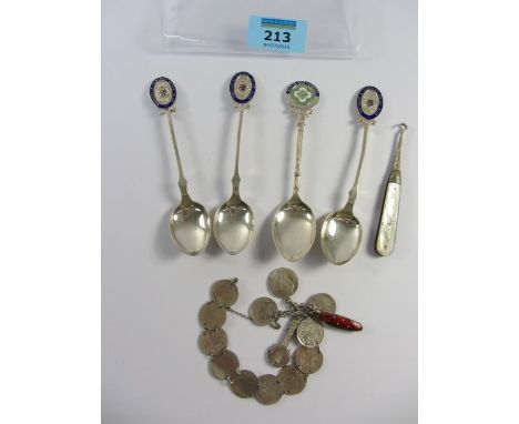 Silver threepenny piece charm bracelet, hallmarked silver motor cycle presentation spoons and a mother of pearl handled butto