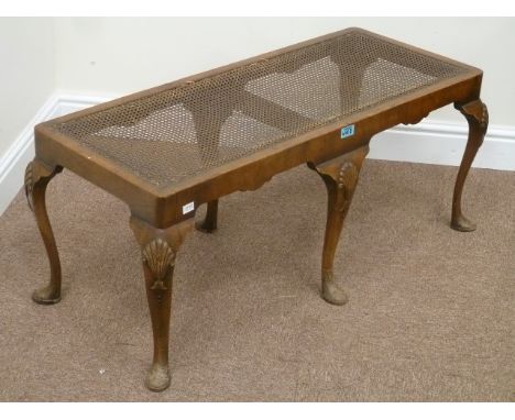 Early 20th century begere stool on six cabriole legs with carved details, W101cm