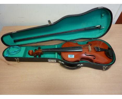 20th century copy of a Stradivarius violin with bow in case