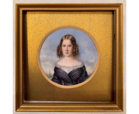 Continental School (19th century): A portrait miniature of a lady, hand-painted a porcelain panel, diameter 7 cm