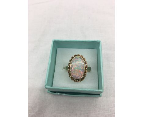 A 9ct opal dress ring