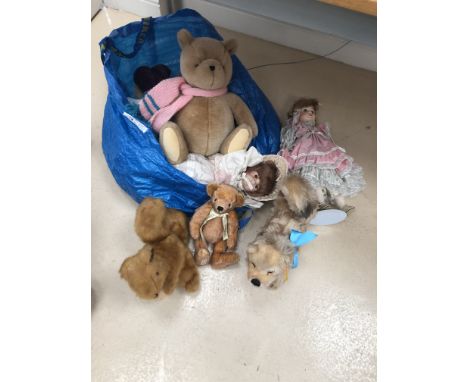 A Steiff dog; together with three Deans bears, dolls etc