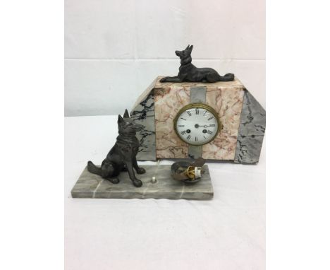 An Art Deco alsation clock and light base