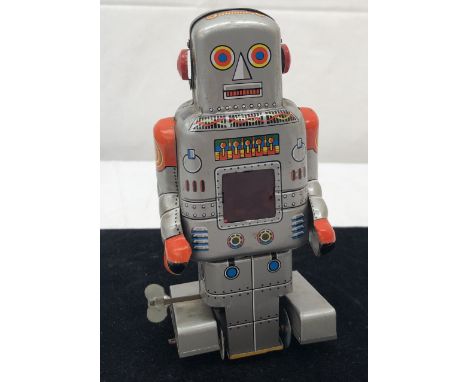 A clockwork Japanese silver robot