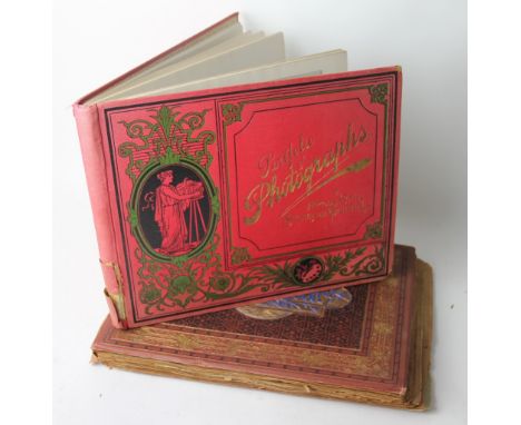 A Victorian scrap album, enclosing various lithograph scrapts of children and flowers, with a folding plate of Plymouth Pier 