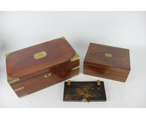 An early Victorian campaign style walnut writing slope, brass bound corners and fitted interior, monogrammed 16.5cm x 40.5cm 