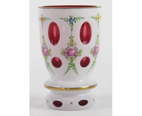 A 19th century Bohemian opaque and ruby flashed vase, painted with flowers,15cm