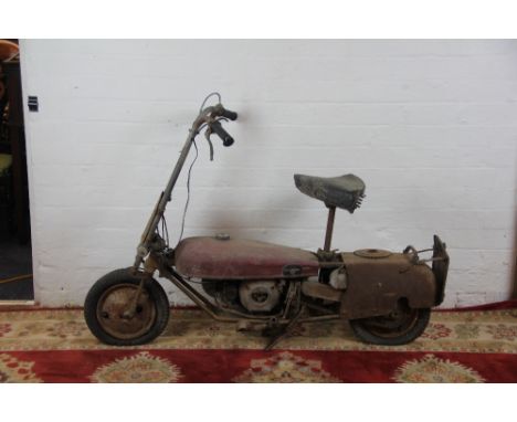 A Brockhouse Corgi folding motorcycle, JUE887, first registered 09/03/1950, 98cc, engine number 15813, sold with a facsimile 