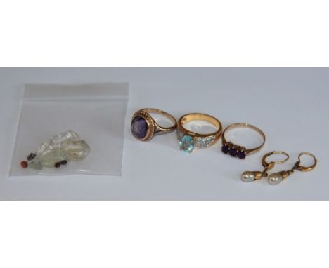 A collection of jewellery to include; an uncut diamond natural and further loose stones, two amethyst set 9ct yellow gold rin