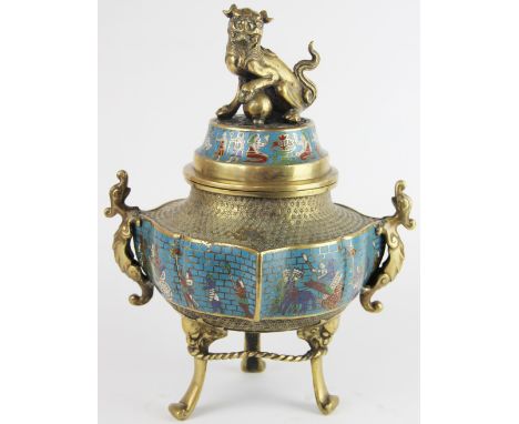A Chinese brass and champleve enamel koro and cover, with temple dog finial and decorated with Egyptian style figures, on scr