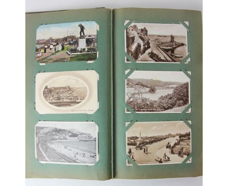 A collection of Edwardian and later postcards, mostly British town and sea views, with some architectural, flowers etc, in th
