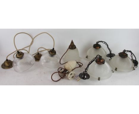 An Edwardian adjustable pendant ceiling light, with frosted glass shade; with three vintage style pendant lights with moulded