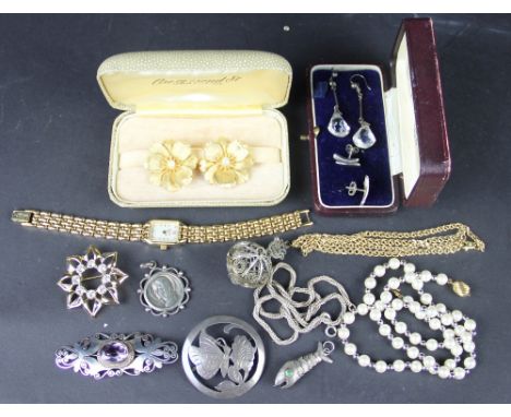 A collection of assorted jewellery, to include; an amethyst set brooch, silver earrings, Ciro floral earrings, brooches, simu